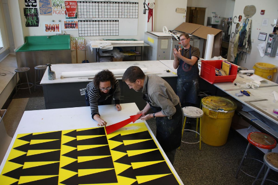 Artist James Siena working at the press with assistant Amelia Jones and master printer Tom Reed at Island Press
